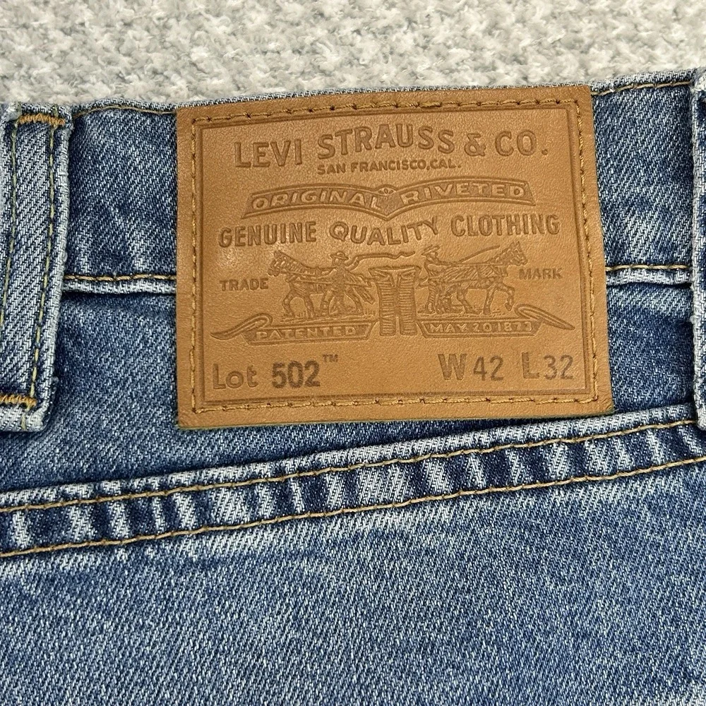 Levi's Jeans Mens 42x32 (42x31) 502 Premium Tapered Medium Wash Casual‎ Denim